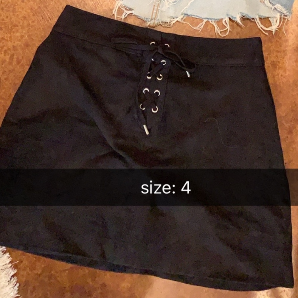 Black lace up front mini skirt